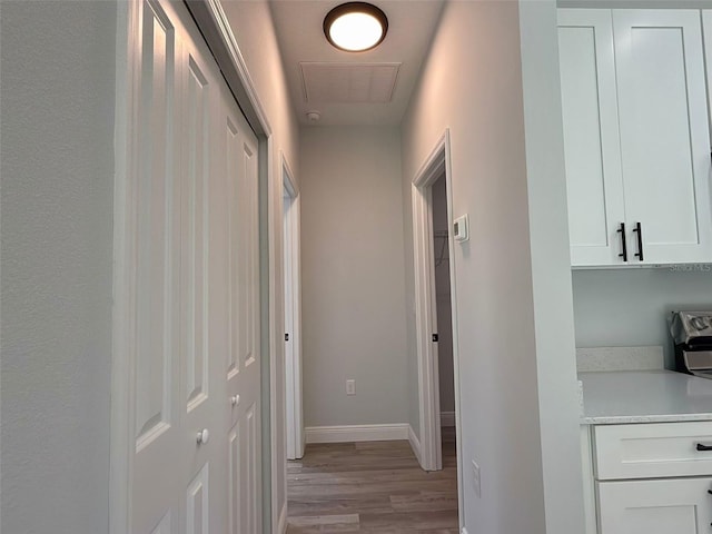 corridor featuring light wood-type flooring