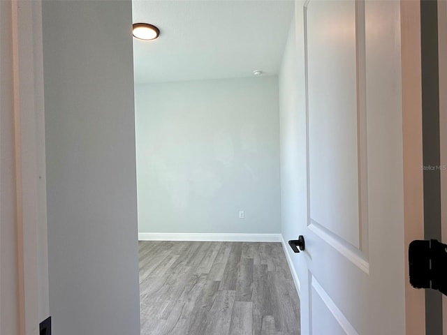 empty room with light hardwood / wood-style floors