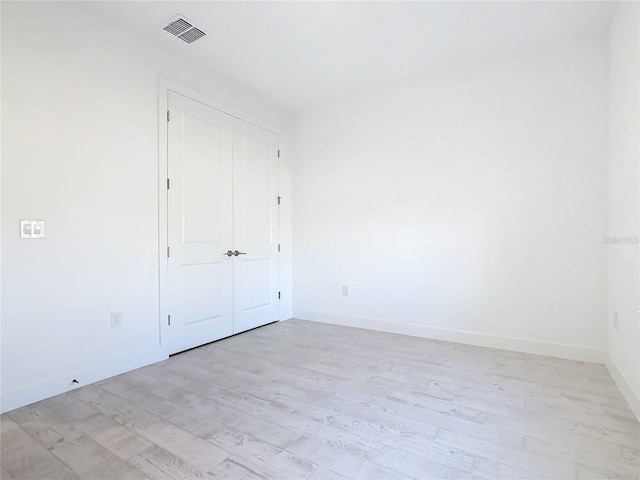 unfurnished bedroom with light hardwood / wood-style floors