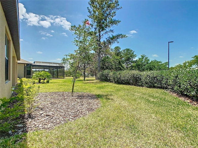 195 Casavista Dr, Kissimmee, FL 34759 - view of yard featuring a lanai