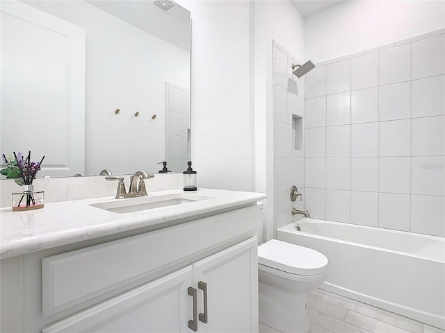 195 Casavista Dr, Kissimmee, FL 34759 - full bathroom with vanity, toilet, and shower / bathtub combination