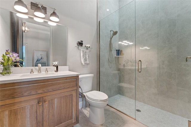 bathroom with vanity, toilet, a shower with door, and crown molding