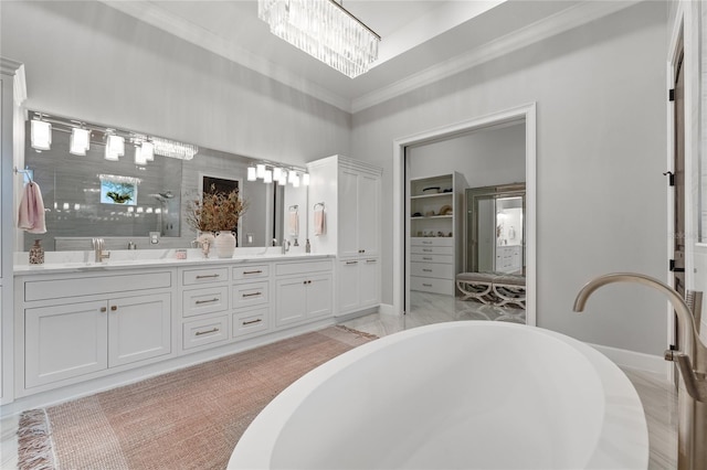 bathroom with an inviting chandelier, crown molding, vanity, independent shower and bath, and hardwood / wood-style flooring