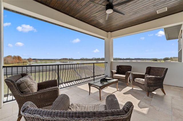 view of patio / terrace featuring ceiling fan, a balcony, and an outdoor hangout area