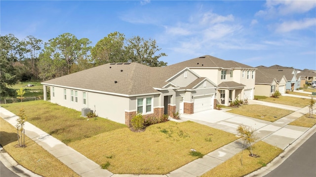 view of front facade featuring central AC unit and a front yard