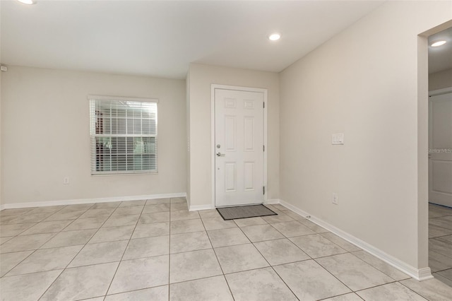 entrance foyer featuring light tile patterned floors