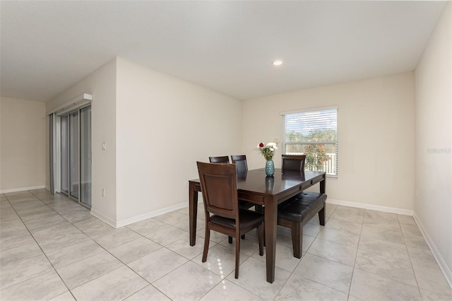 view of tiled dining space