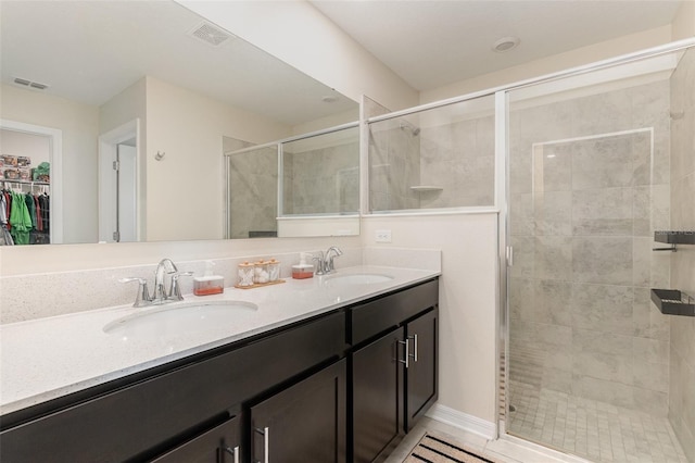 bathroom featuring vanity and walk in shower