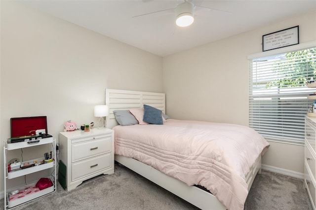 bedroom featuring light carpet and ceiling fan