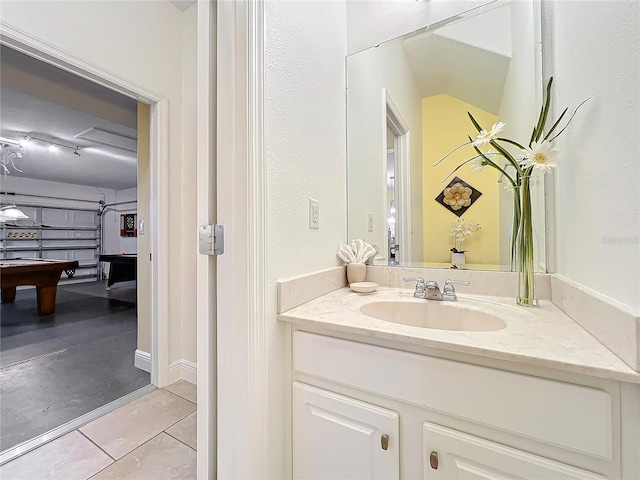 bathroom featuring tile patterned floors, vanity, and billiards