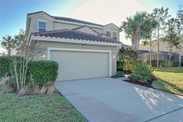 view of front facade featuring a front lawn and a garage