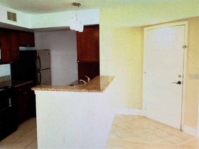 kitchen with sink and range