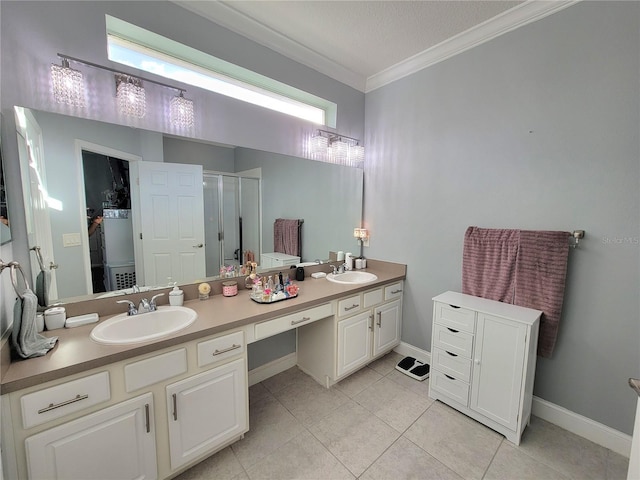 bathroom featuring vanity, tile patterned flooring, ornamental molding, a textured ceiling, and a shower with door