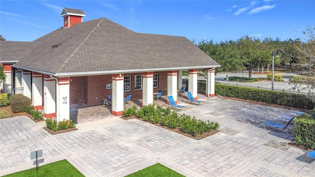 back of house with a patio