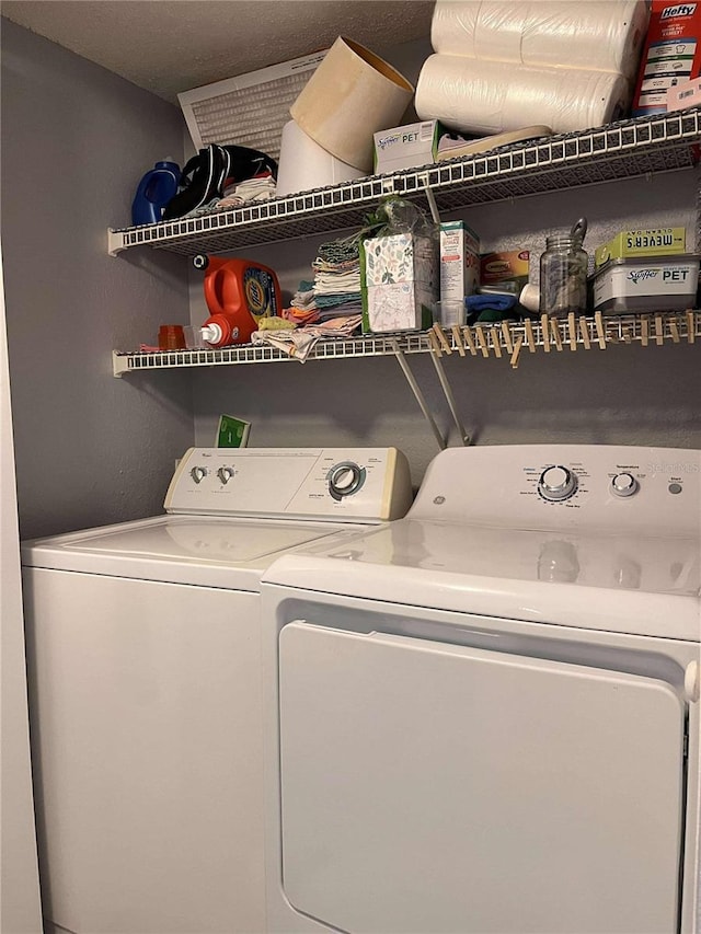 laundry area featuring independent washer and dryer