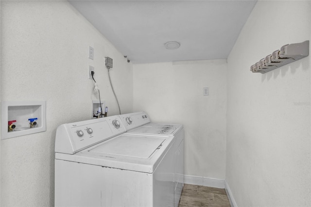 laundry room featuring independent washer and dryer