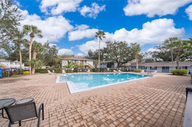 view of swimming pool featuring a patio