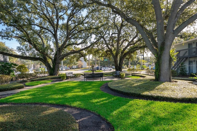 view of community featuring a yard