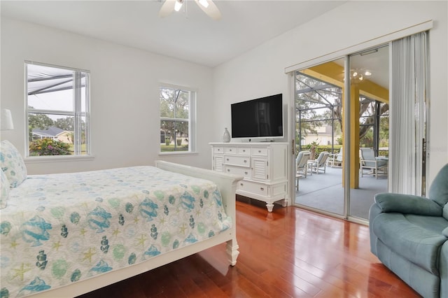 bedroom with access to outside, ceiling fan, and hardwood / wood-style flooring