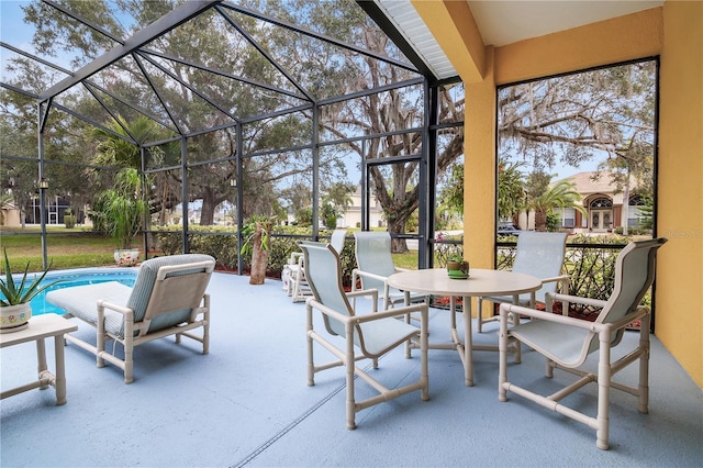 view of patio / terrace with glass enclosure