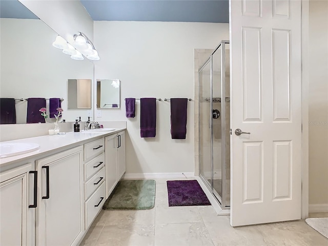 bathroom featuring vanity and walk in shower