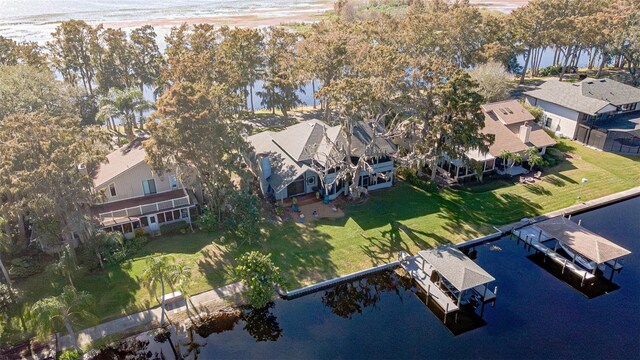 drone / aerial view with a water view