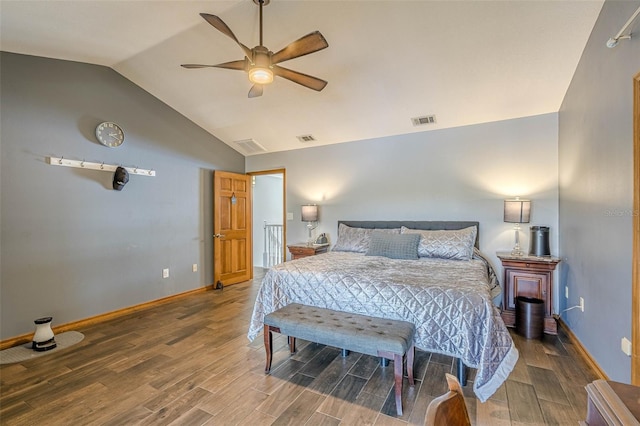 bedroom with vaulted ceiling, ceiling fan, and wood-type flooring