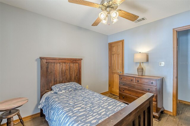 bedroom featuring ceiling fan and light hardwood / wood-style floors