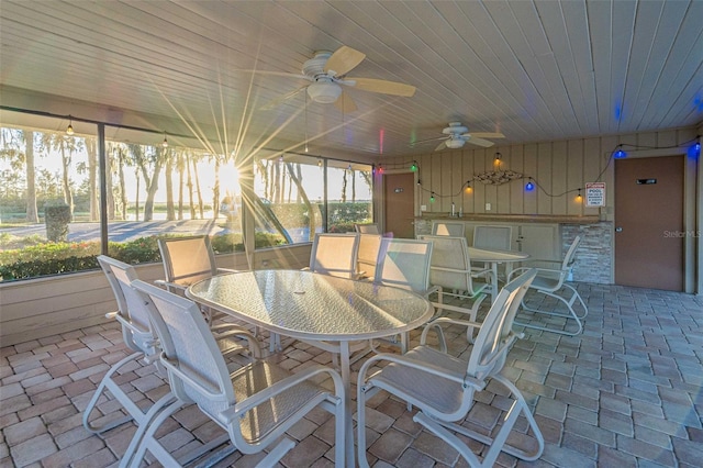 exterior space with ceiling fan and plenty of natural light