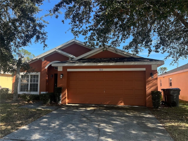 view of front of property featuring a garage