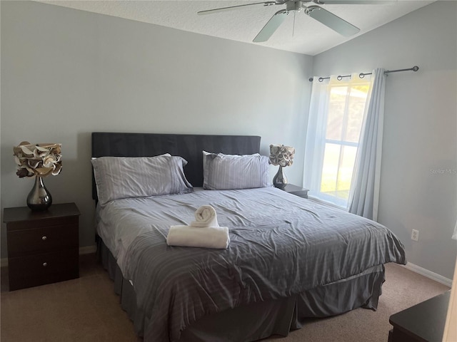 bedroom with carpet floors, ceiling fan, and lofted ceiling