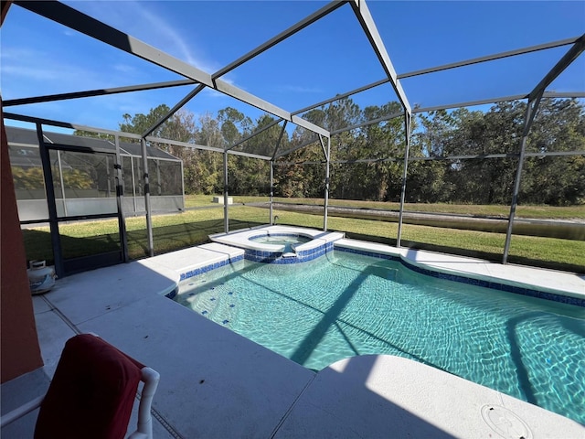 view of pool featuring glass enclosure, an in ground hot tub, a yard, and a patio