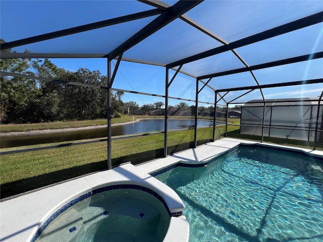 view of pool with a lawn, a lanai, a water view, and an in ground hot tub