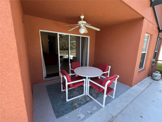 view of patio / terrace with ceiling fan