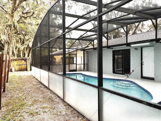 view of pool with a lanai