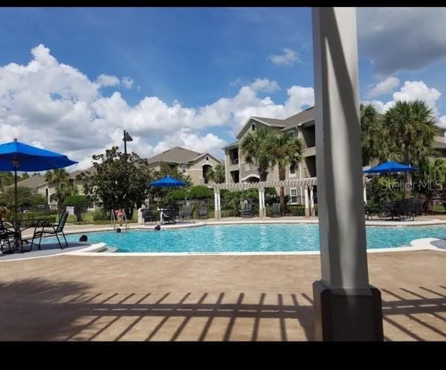 view of pool with a patio