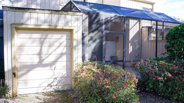 view of side of property featuring a garage