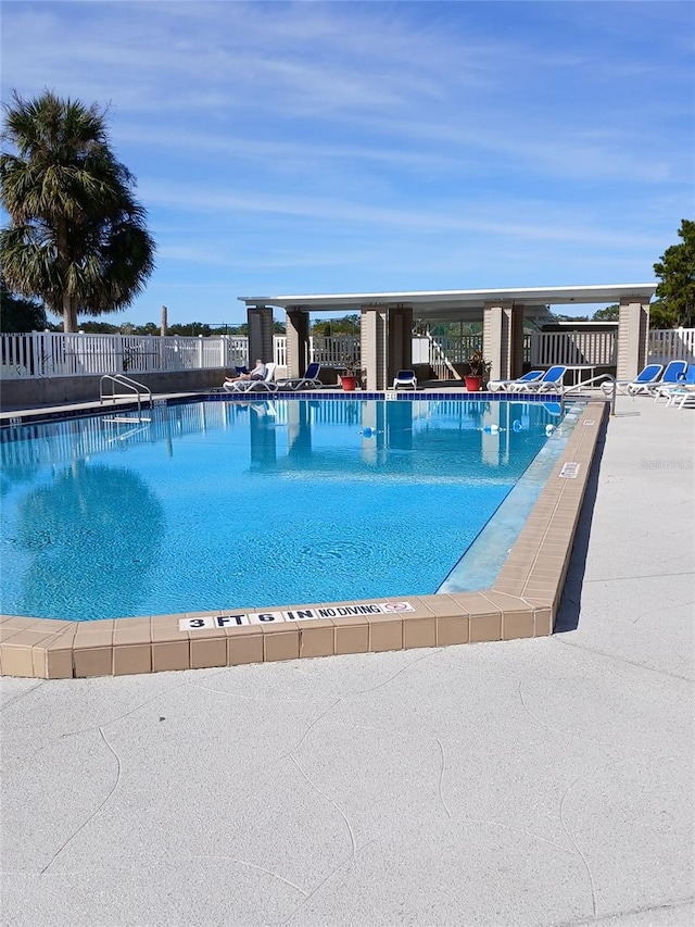 view of pool with a patio area