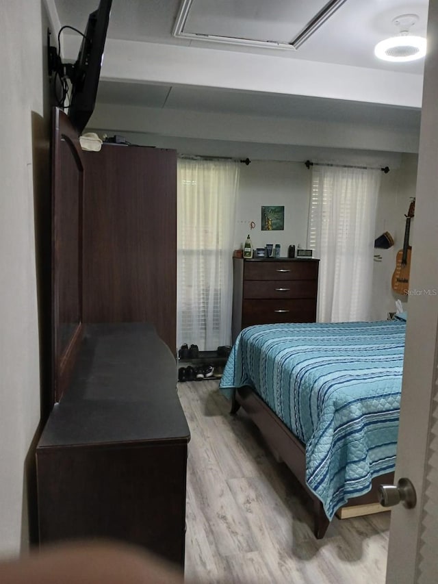 bedroom featuring light hardwood / wood-style floors