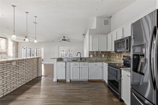 kitchen with white cabinets, stainless steel fridge with ice dispenser, and black electric range oven