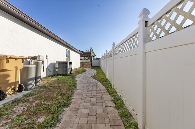 view of yard featuring central AC unit