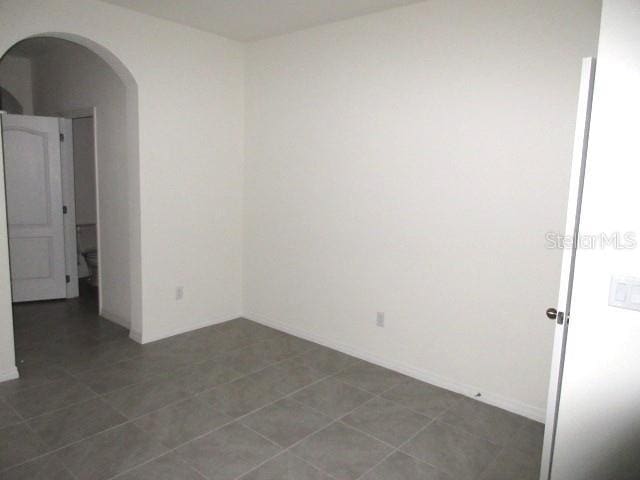 view of tiled empty room