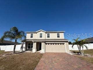 front facade with a garage