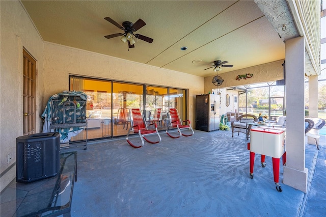 view of patio with ceiling fan