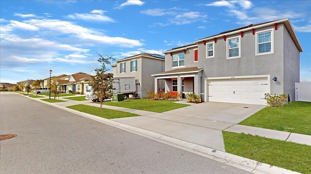 view of front facade featuring a garage and a front yard