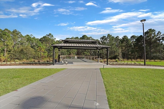 view of property's community featuring a gazebo and a yard