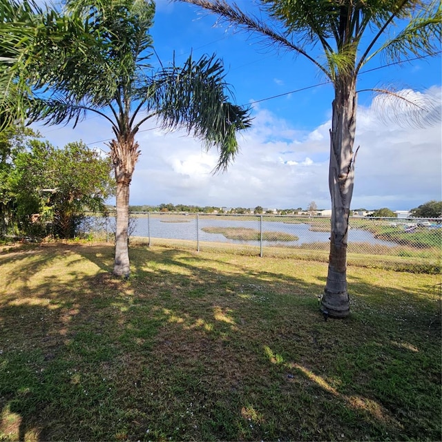 view of yard with a water view