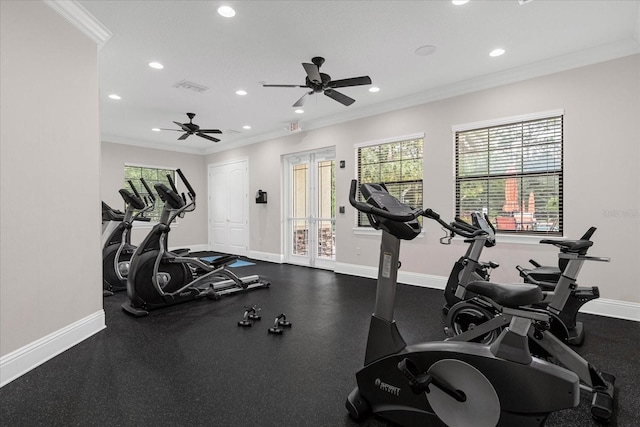 workout area featuring ceiling fan and crown molding