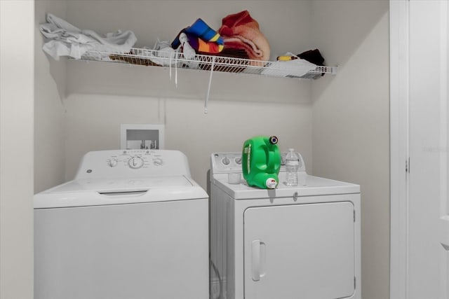 laundry room with washer and dryer