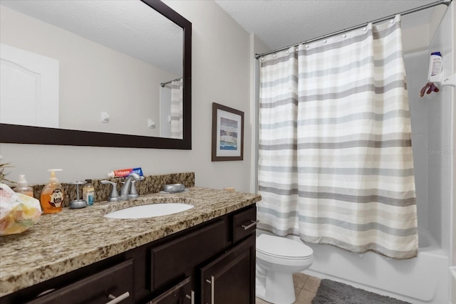 full bathroom with vanity, tile patterned floors, toilet, shower / bathtub combination with curtain, and a textured ceiling